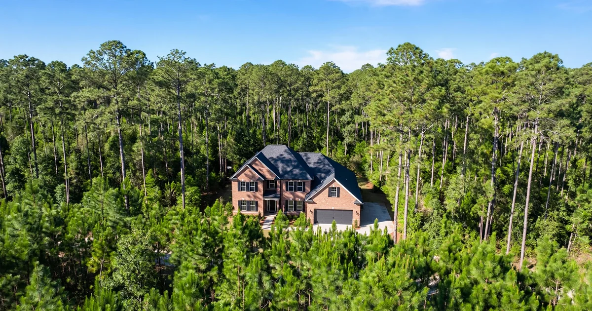 Harpers Preserve roof repair in Conroe: suburban home with architectural shingle roof