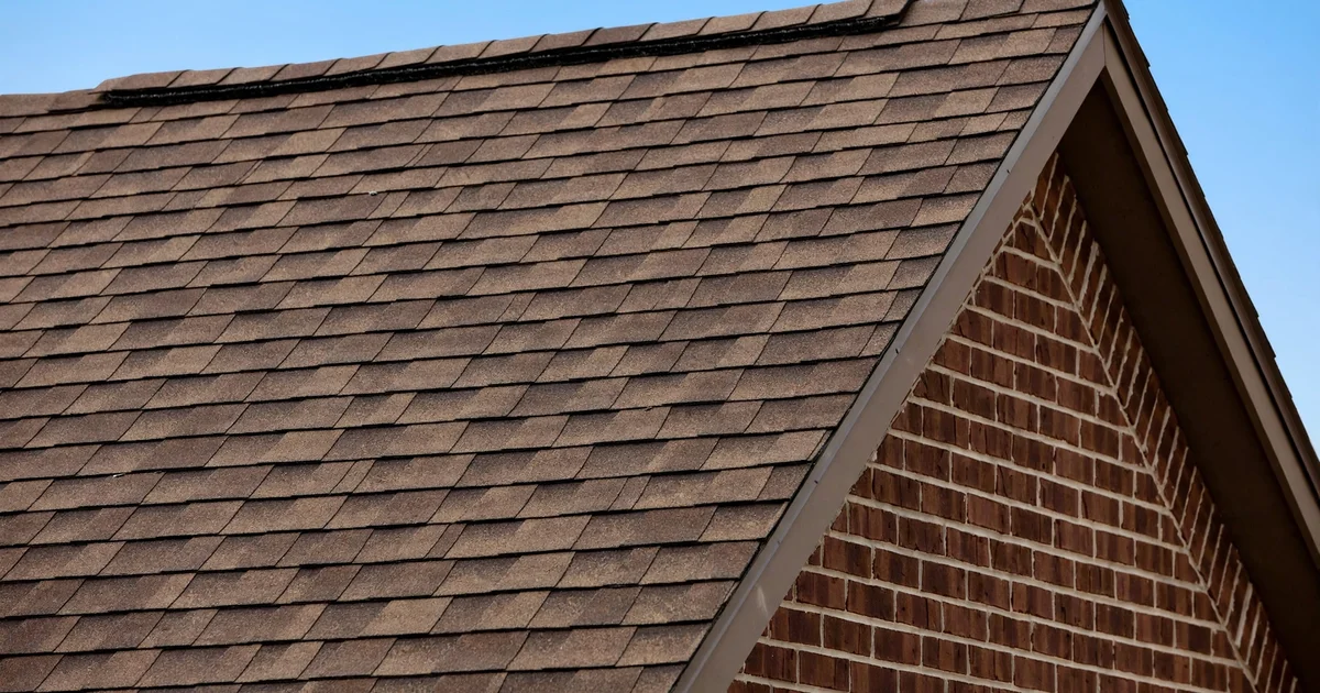 Sweetwater roof repair in Sugar Land: suburban home with architectural shingle roof